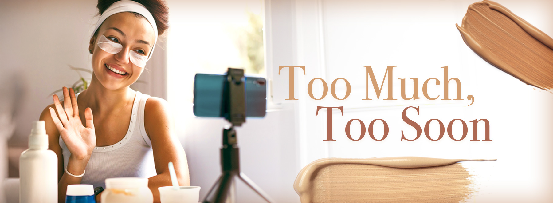 A teenager applying makeup in front of a camera, capturing the moment for social media.